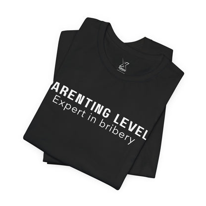 Parenting Humor Shirt | Unisex T-Shirt | Funny Parent Tee | Gift for Moms and Dads | Casual Family Outfit | “Parenting Level: Expert in Bribery”